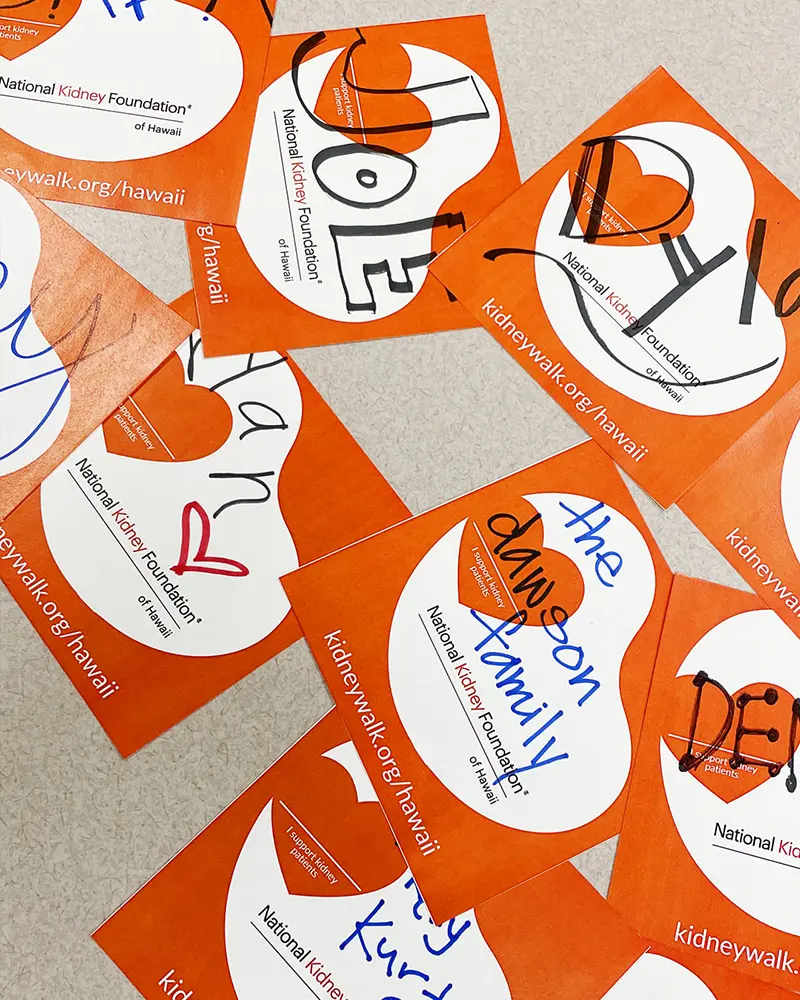 Several National Kidney Foundation of Hawaii promotional cards signed by families and individuals.